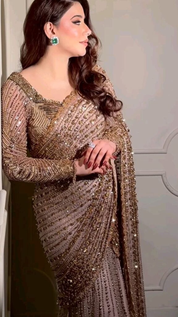 Golden Sequin Saree Top 5 – The Most Trending Luxury Ethnic Attire for Weddings and Grand Celebrations 1 Golden sequin saree
Designer golden saree
