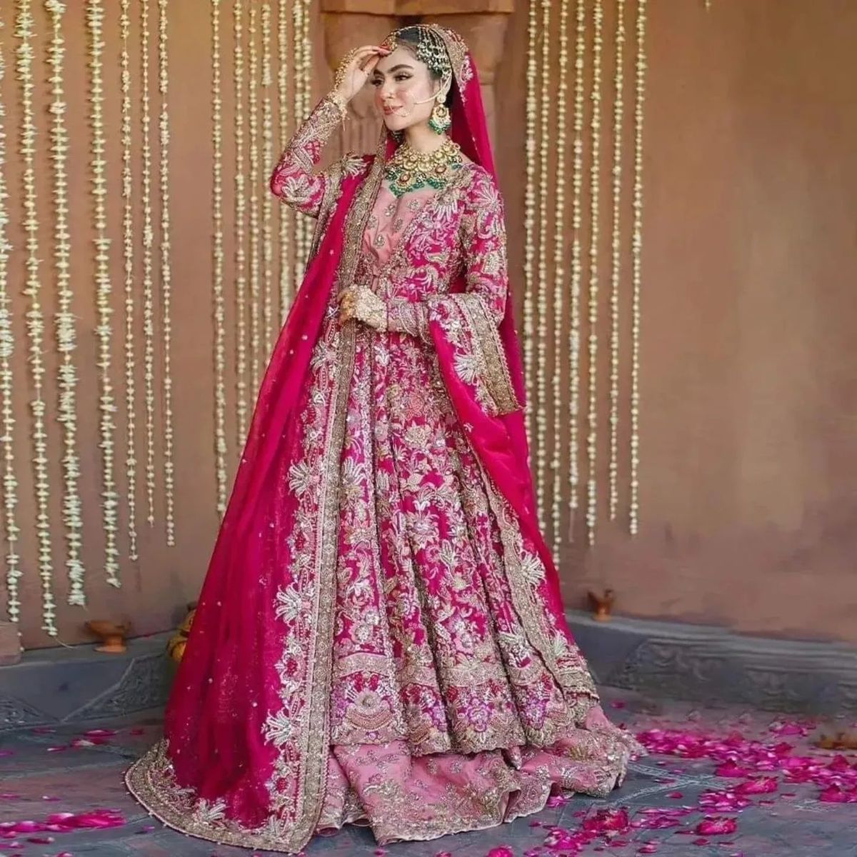 Front slit starting from the waistline down to the hem, paired with a heavy lehenga, sharara, or fitted churidar