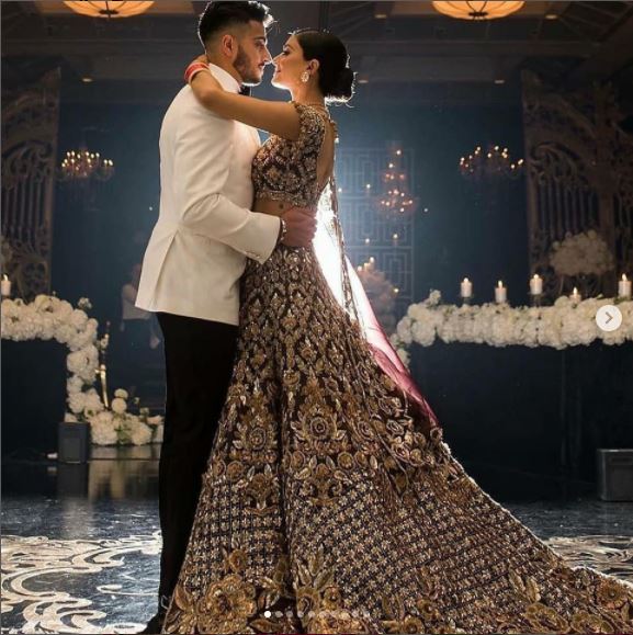 Kshkin Designer Long Trail Bridal Lehenga Maroon Darker Golden emblishment New Dress - DN-2069
