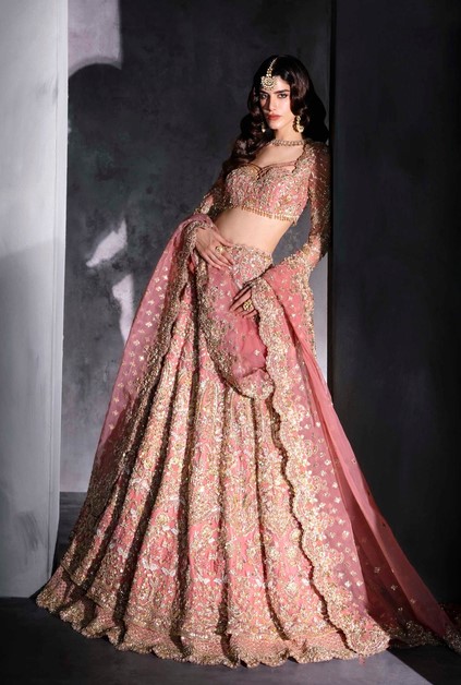 Pakistani bridal pink lehenga with handcrafted zardozi and beadwork details.