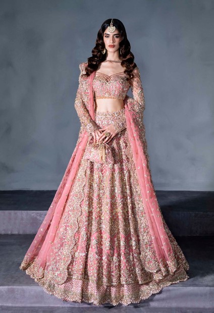 Pink handwork designer lehenga choli with intricate gold zardozi embroidery.
