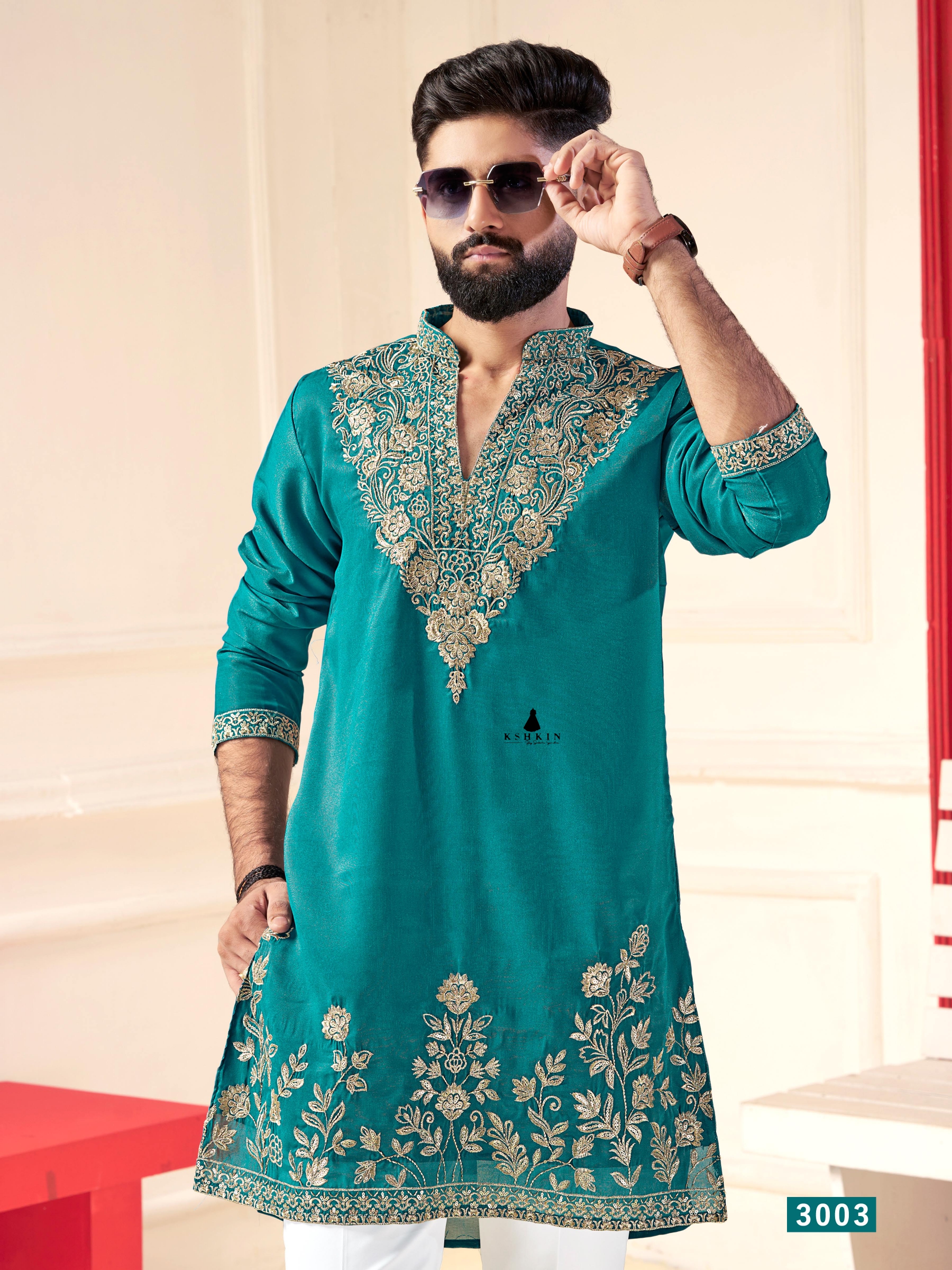 Teal green silk kurta set with intricate gold zari embroidery for men party wear