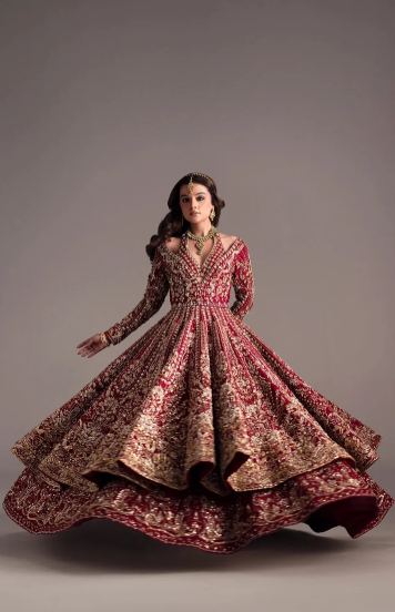 Red bridal dress with intricate gold Zardosi embroidery