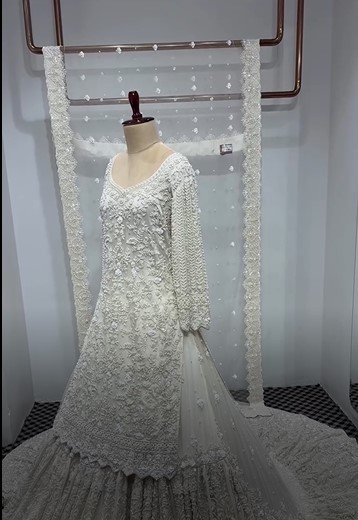 Luxury white ivory net base bridal dress with heavy hand embroidery