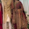 Mr. Faisu wife bridal dress featuring luxurious golden zamavar and heavy zardosi embroidery