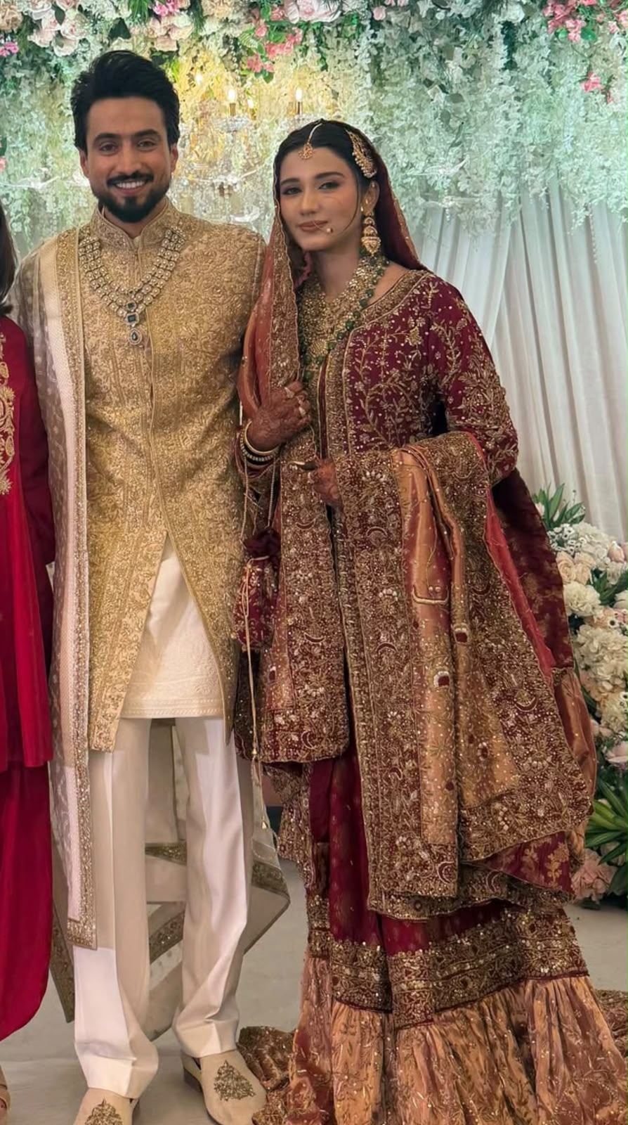 Mr. Faisu wife bridal dress featuring luxurious golden zamavar and heavy zardosi embroidery
