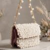 Elegant miniature pearl flap clutch for weddings and parties