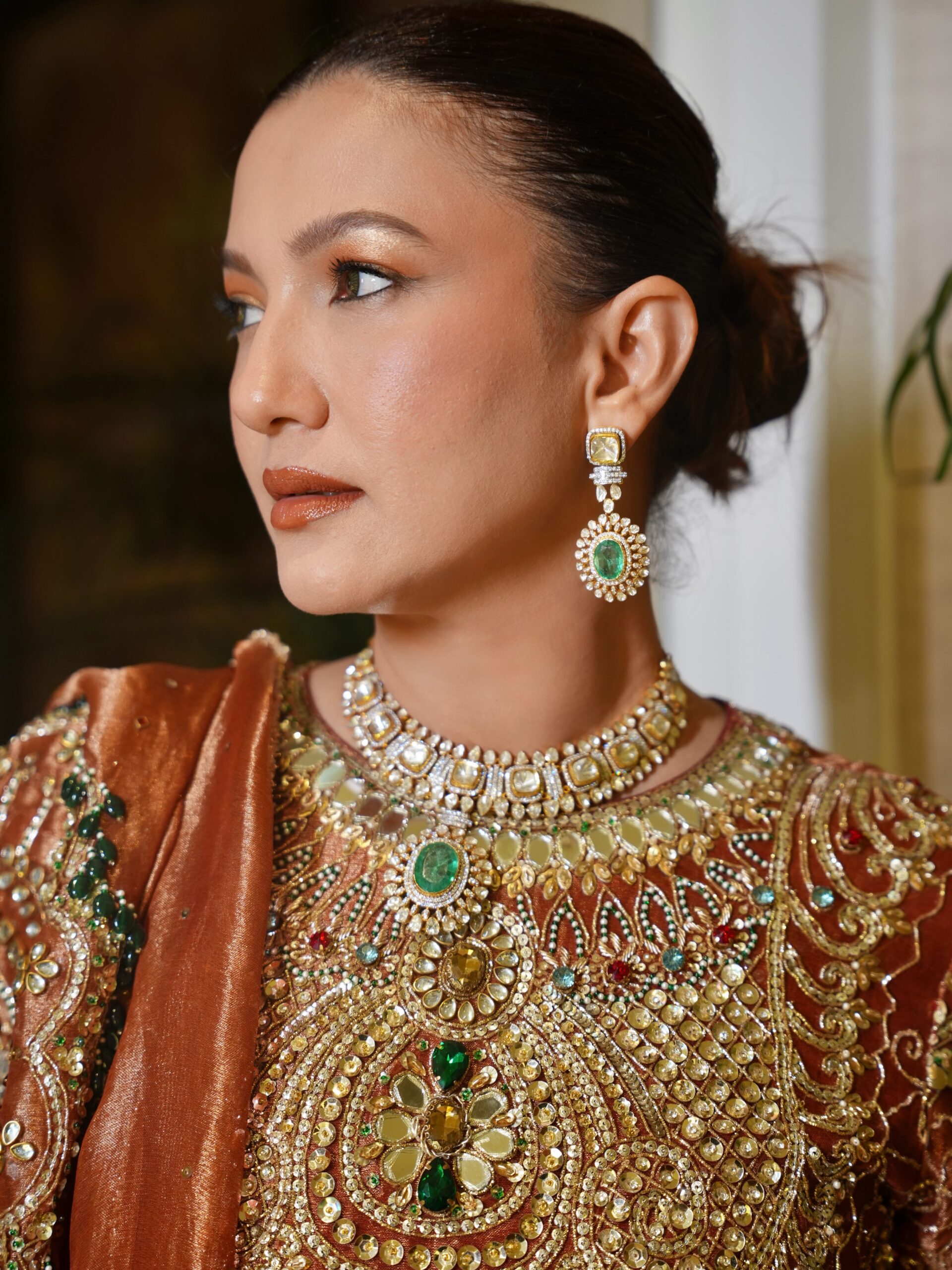 Close-up of intricate hand embroidery on Gauahar Khan style festive suit