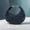 Luxury beaded evening party clutch bag with stylish curved silhouette