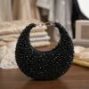 Premium crystal embellished crescent clutch bag for festive and cocktail looks
