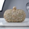 Hand-embroidered golden Zardosi wedding clutch by Kshkin
